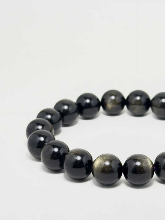 Full Golden Obsidian bracelet with polished 10mm beads — designed for transformation, protection, and inner power.
