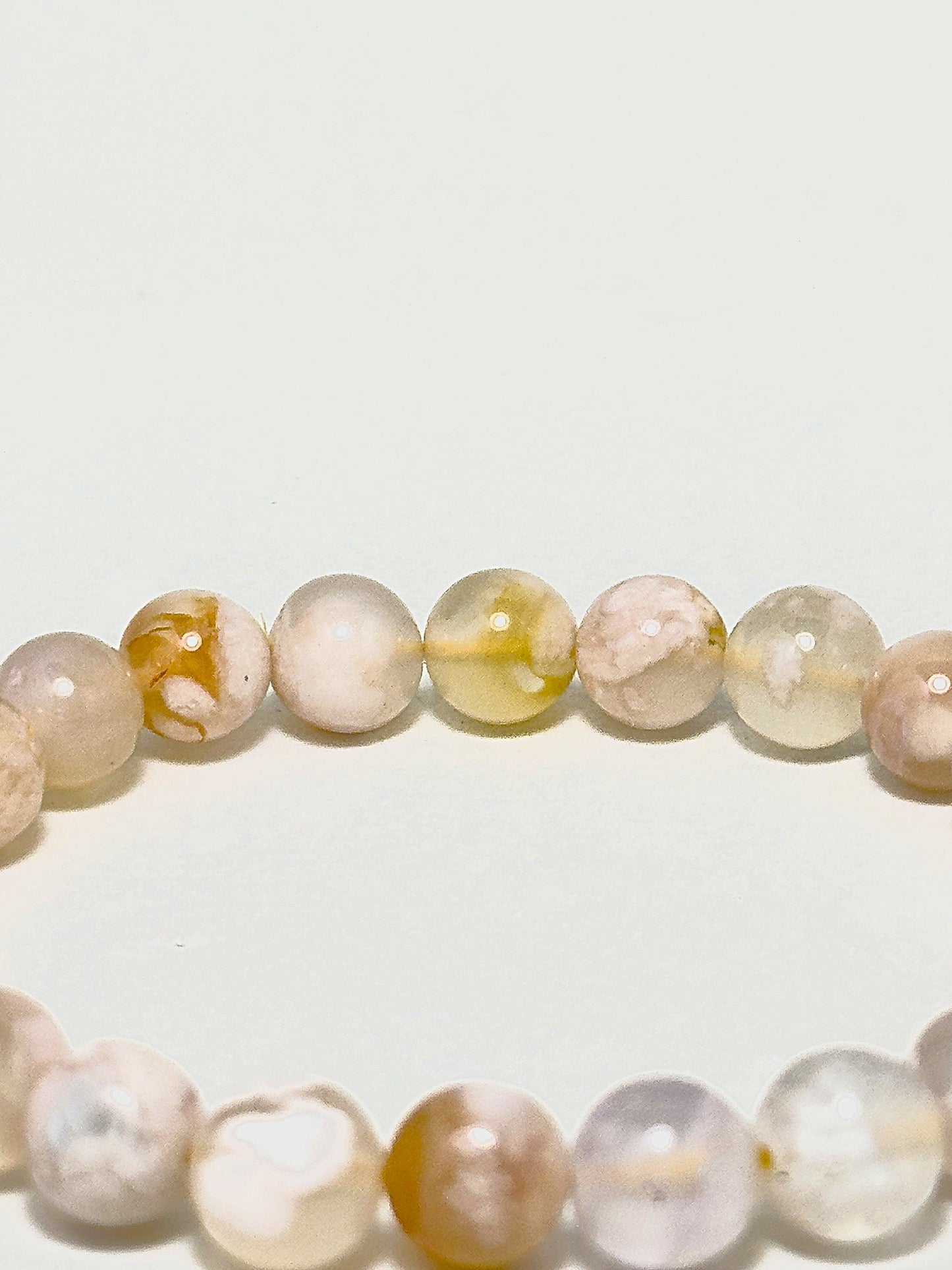 Cherry Blossom Agate bracelet close-up on wrist