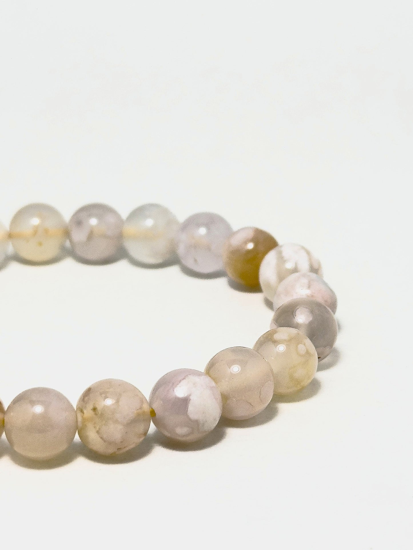 Cherry Blossom Agate bracelet close-up on wrist