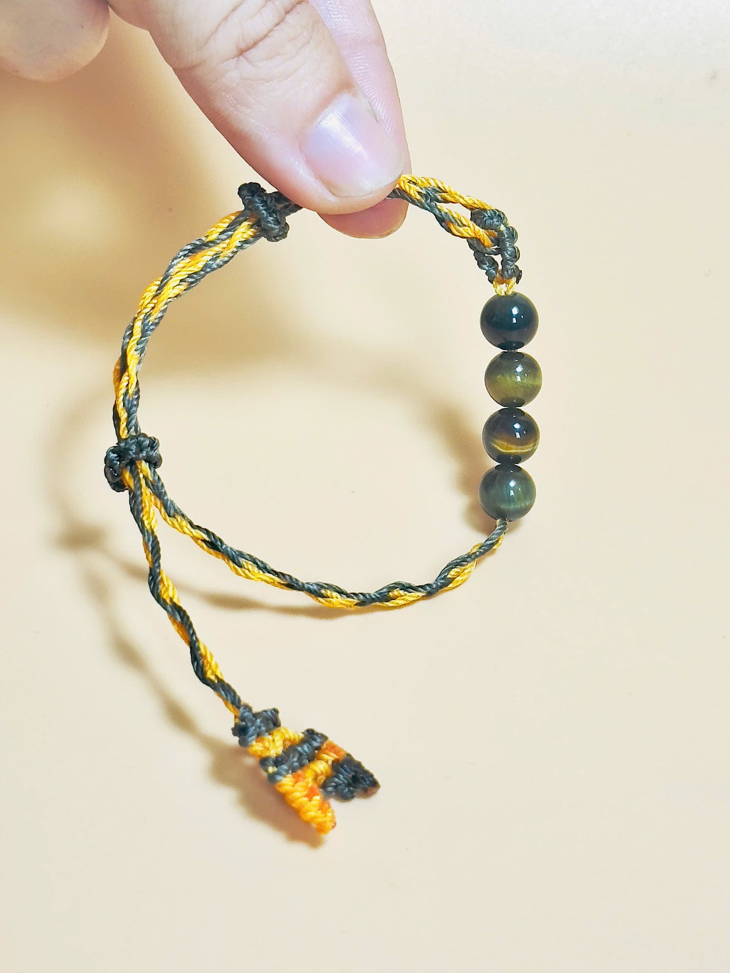 Golden brown Tiger’s Eye bracelet with whale tail macrame closure