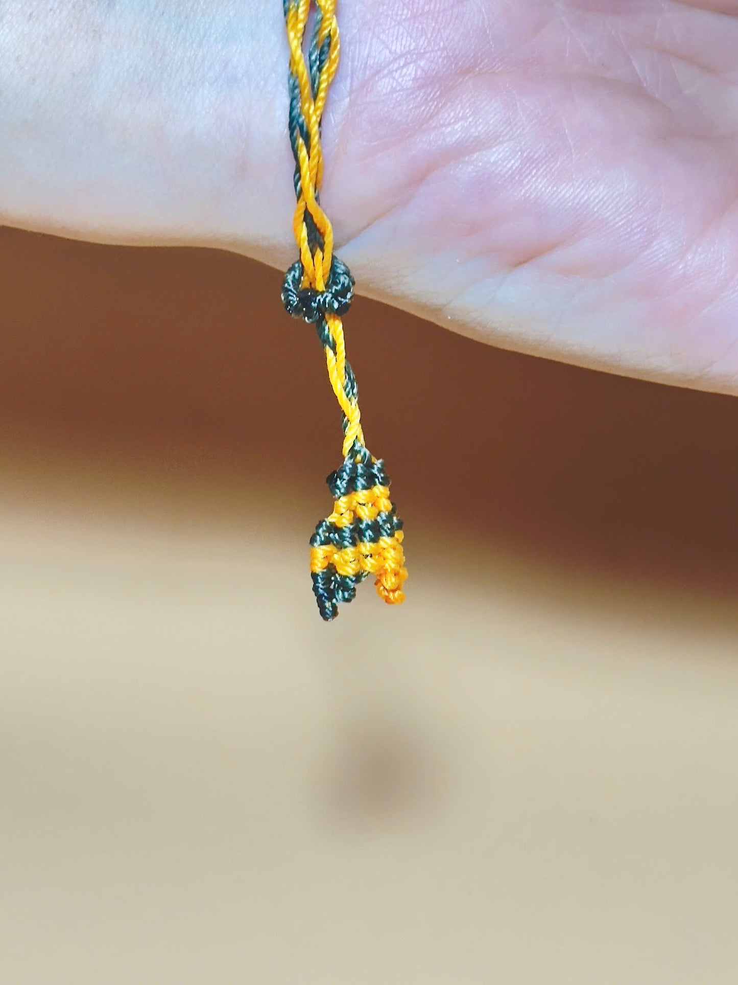 Golden brown Tiger’s Eye bracelet with whale tail macrame closure
