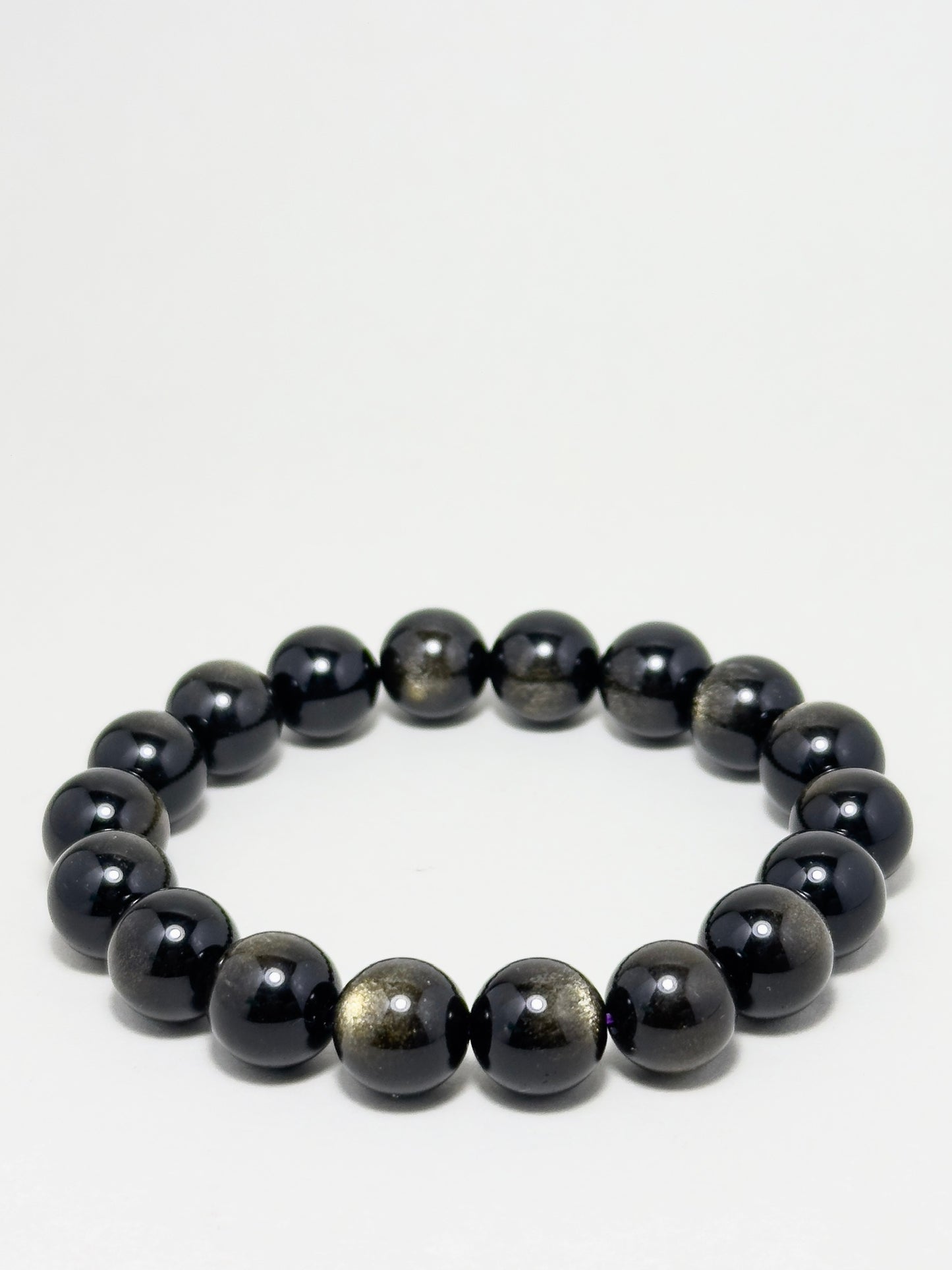 Full Golden Obsidian bracelet with polished 10mm beads — designed for transformation, protection, and inner power.