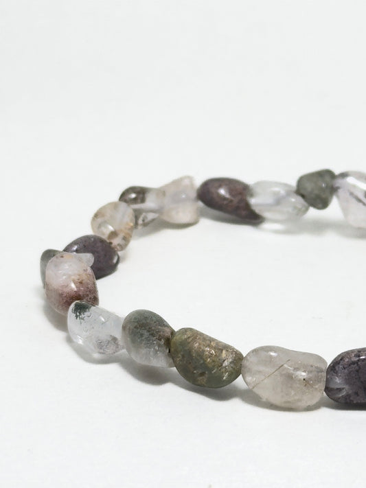 Handmade full Phantom Quartz bracelet with irregular natural stones in earthy tones — designed to support spiritual growth, clarity, and inner guidance.