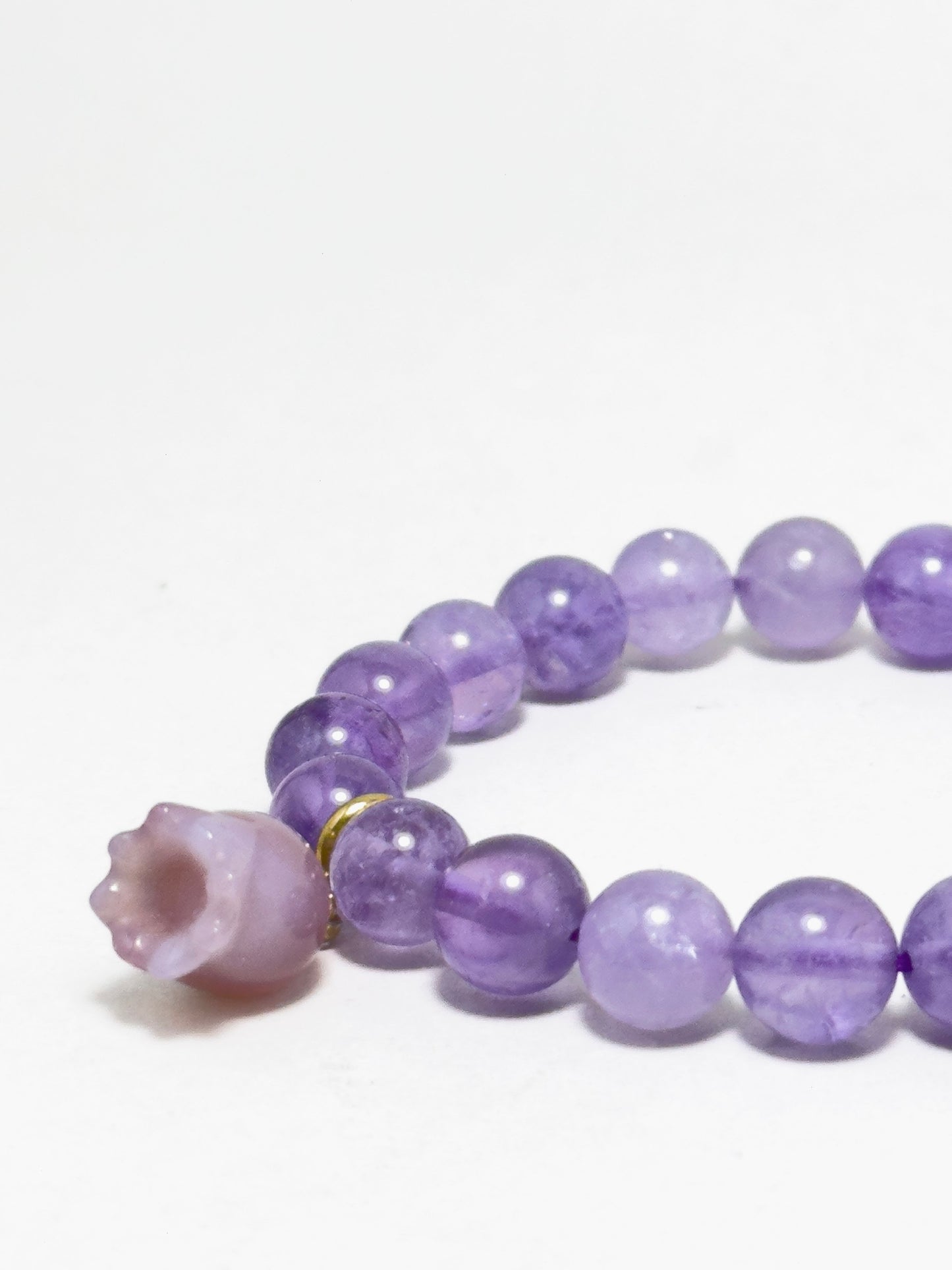 Peace of Mind amethyst bracelet with rose quartz charm
