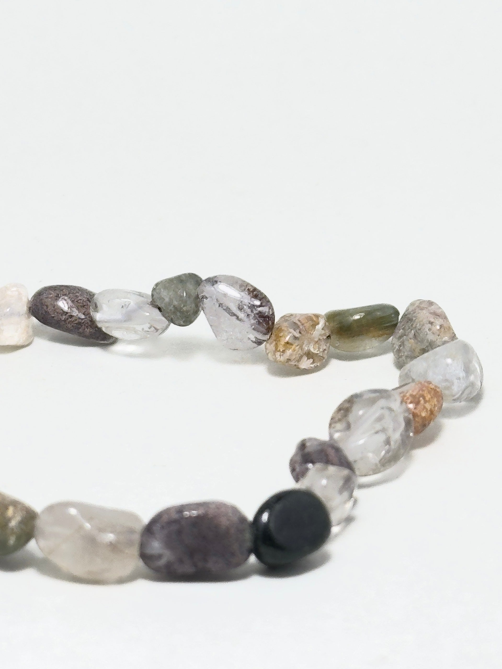 Handmade full Phantom Quartz bracelet with irregular natural stones in earthy tones — designed to support spiritual growth, clarity, and inner guidance.