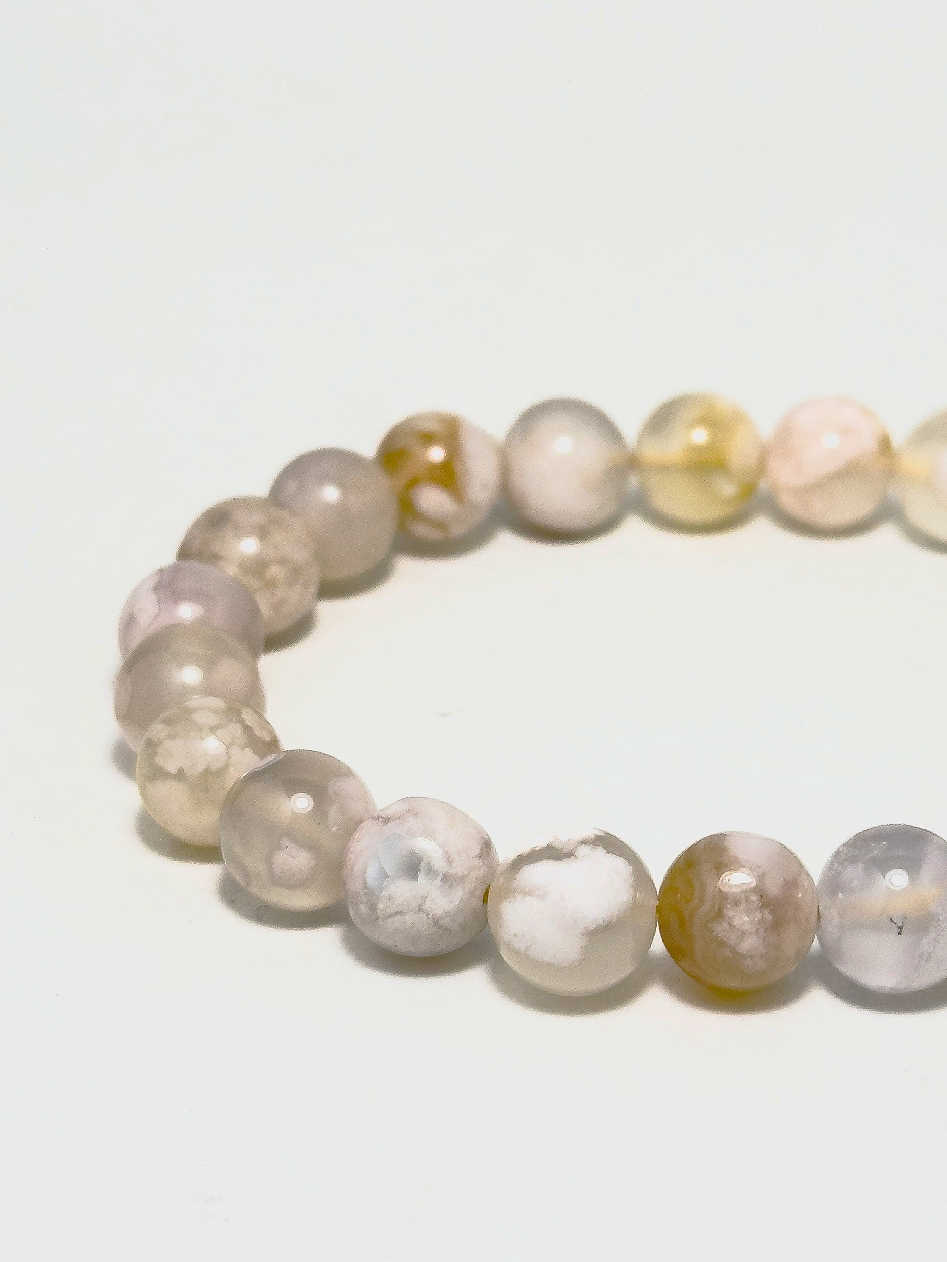 Cherry Blossom Agate bracelet close-up on wrist