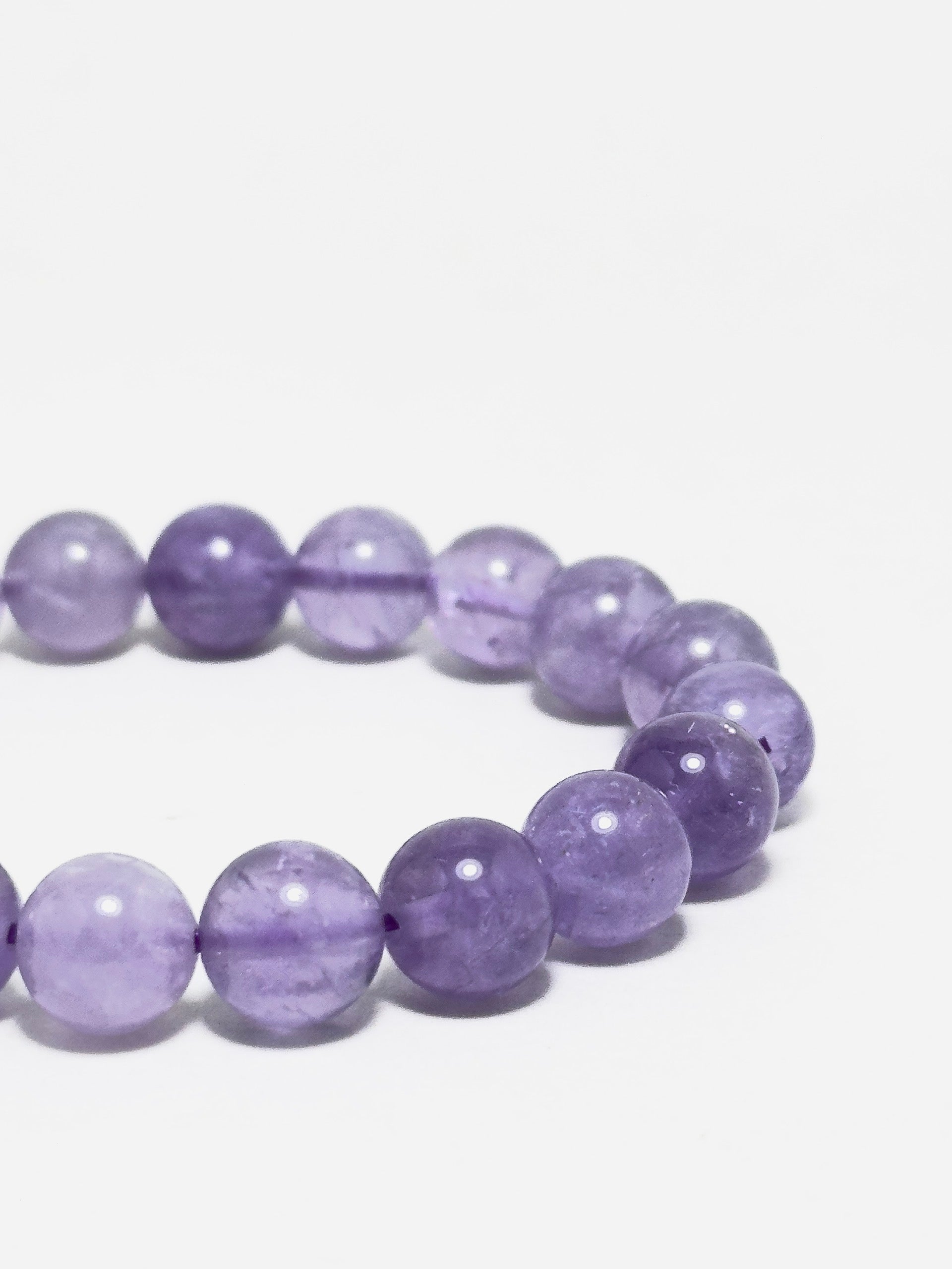 Peace of Mind amethyst bracelet with rose quartz charm