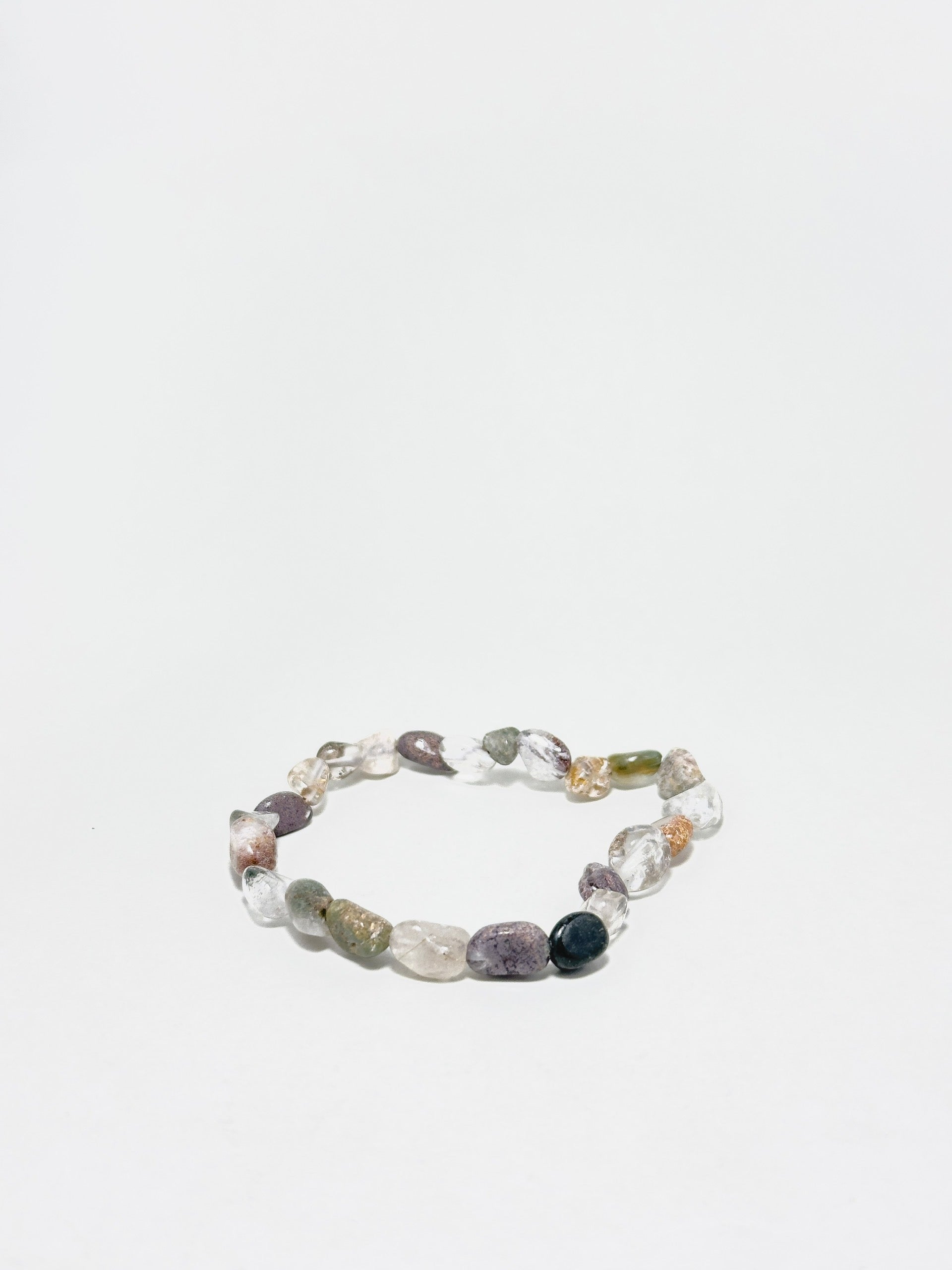 Handmade full Phantom Quartz bracelet with irregular natural stones in earthy tones — designed to support spiritual growth, clarity, and inner guidance.
