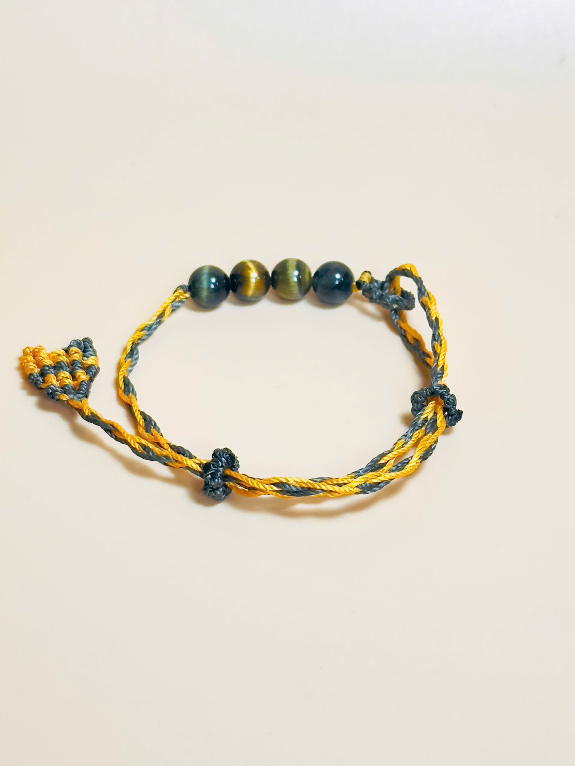 Golden brown Tiger’s Eye bracelet with whale tail macrame closure