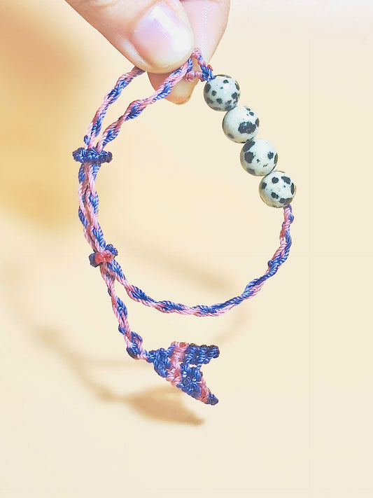 Dalmatian jasper bracelet with spotted stones and whale tail detail
