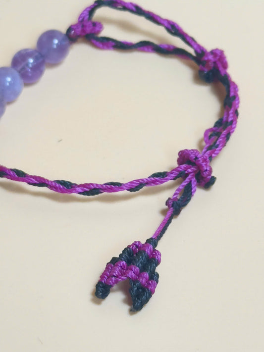 Purple Amethyst bracelet with soft waxed cord and whale tail finish