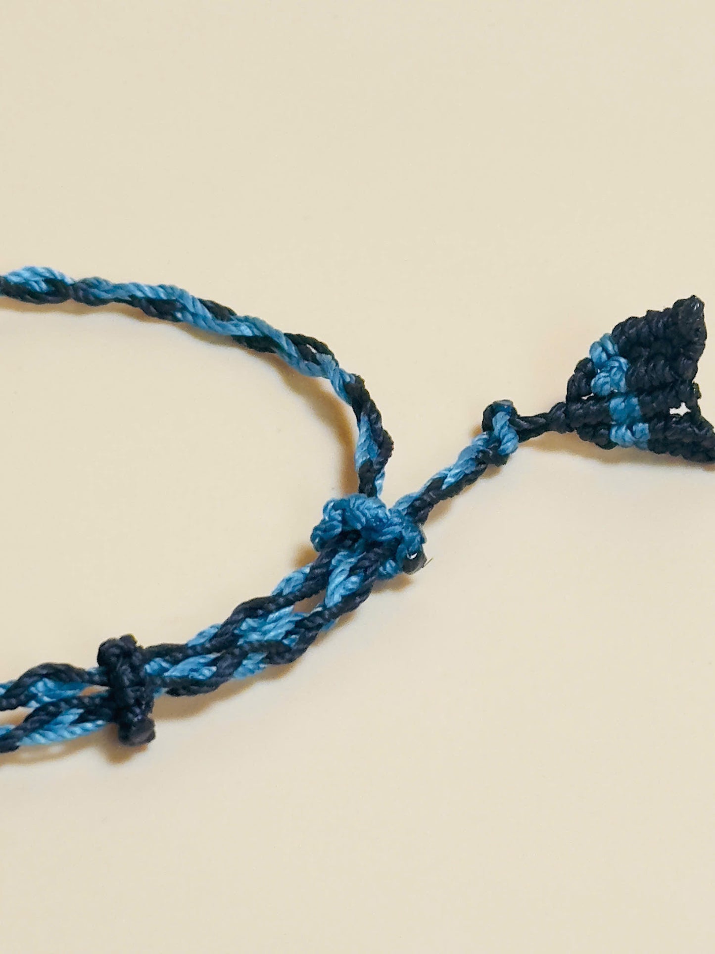 Black obsidian bracelet with whale tail macrame and bold look