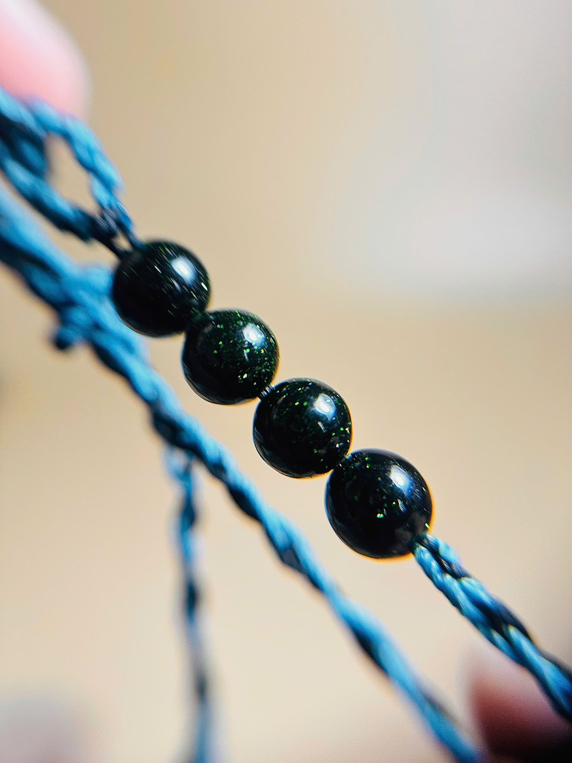 Black obsidian bracelet with whale tail macrame and bold look