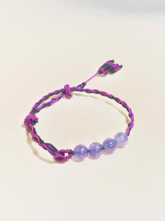 Purple Amethyst bracelet with soft waxed cord and whale tail finish