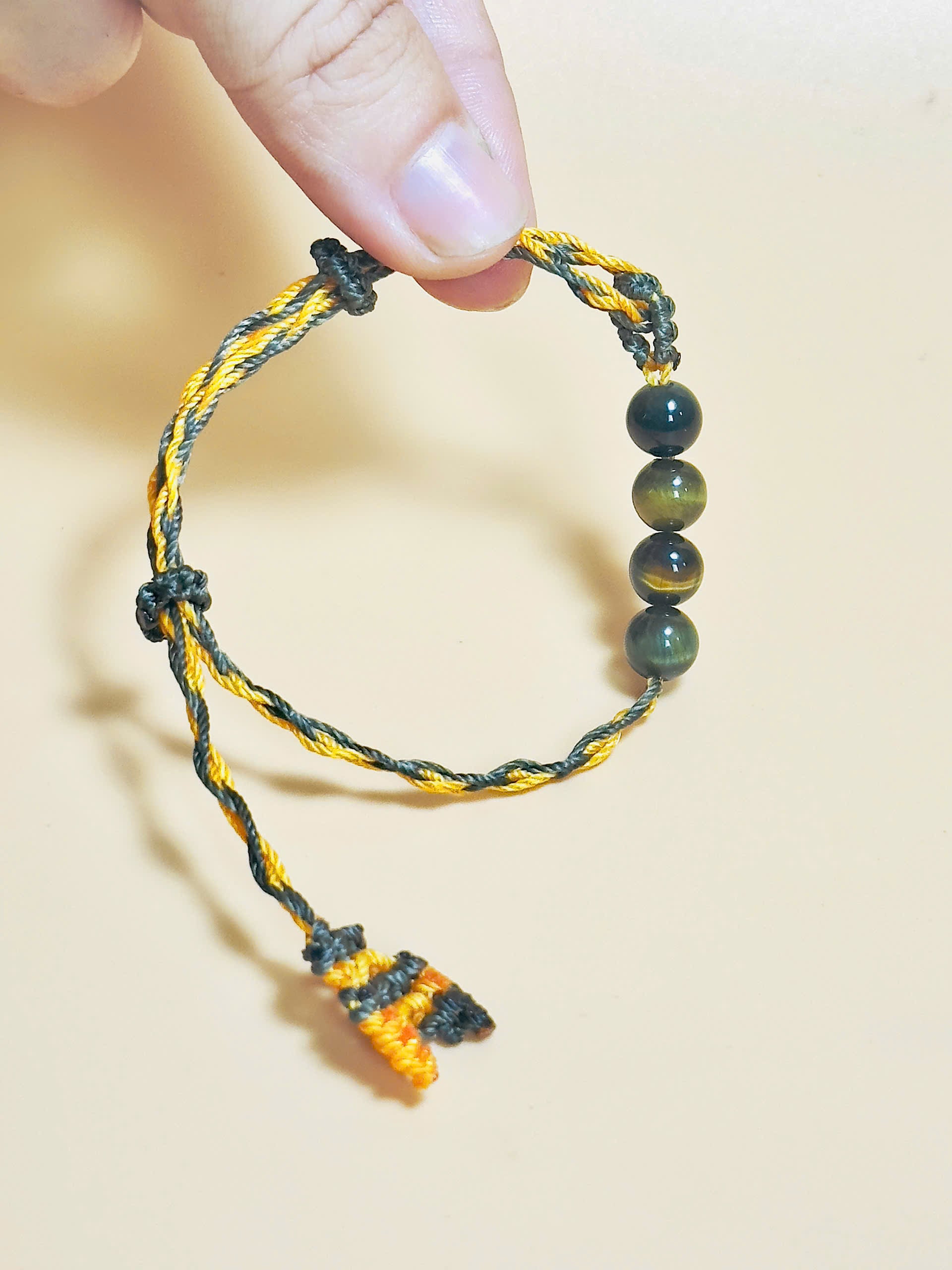 Golden brown Tiger’s Eye bracelet with whale tail macrame closure