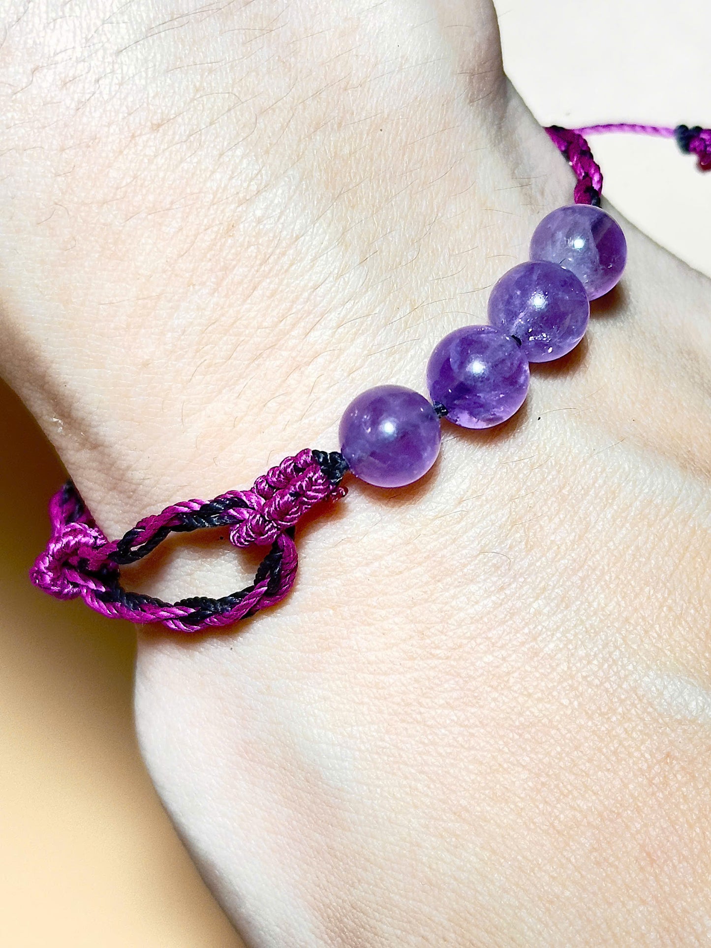 Purple Amethyst bracelet with soft waxed cord and whale tail finish