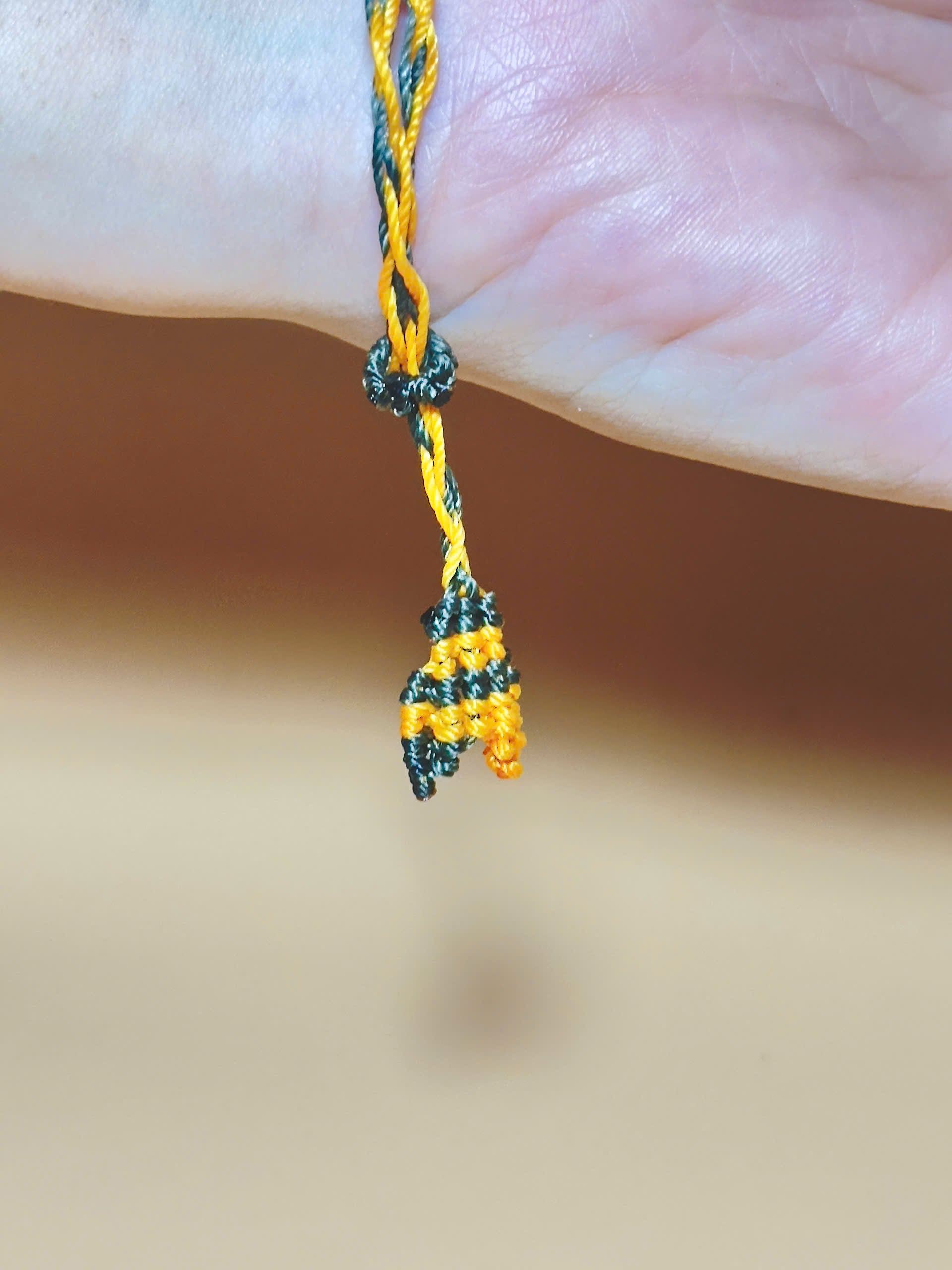 Golden brown Tiger’s Eye bracelet with whale tail macrame closure