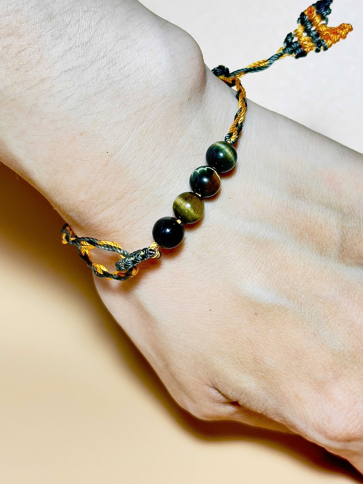 Golden brown Tiger’s Eye bracelet with whale tail macrame closure